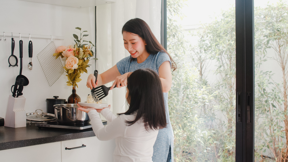 young-asian-japanese-mom-daughter-cooking-home-lifestyle-women-happy-making-pasta-spaghetti-together-breakfast-meal-modern-kitchen-house-morning